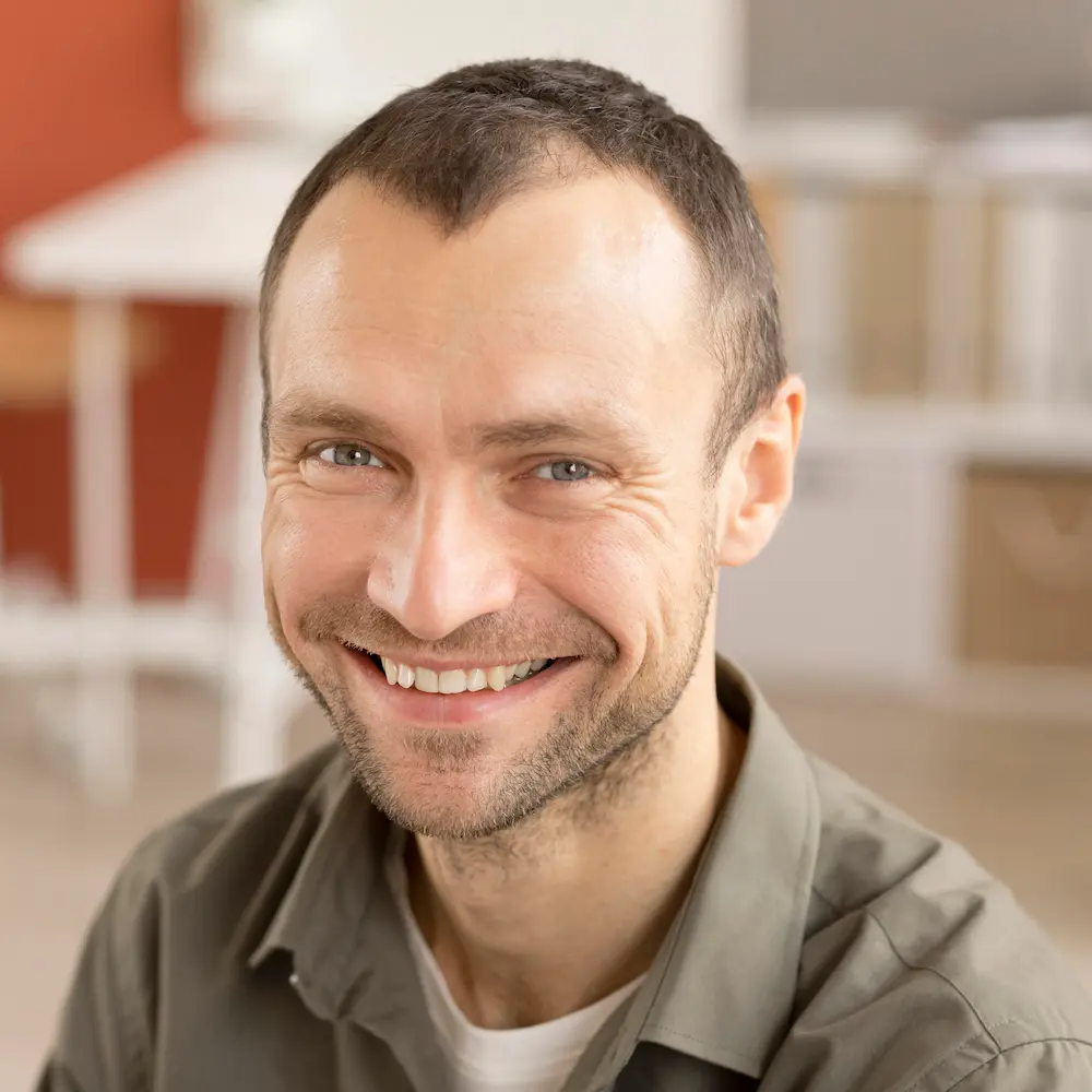 portrait-employee-happy-be-back-work